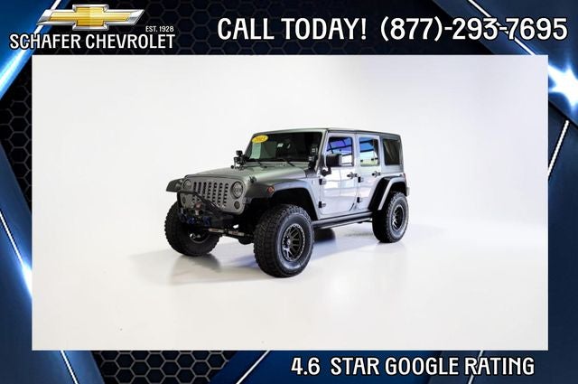 2013 Jeep Wrangler Unlimited Sahara in Billet Metallic Clearcoat — front three-quarter view
