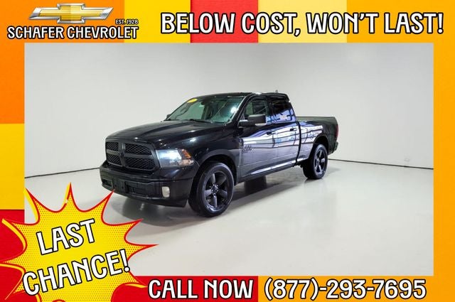 2021 RAM 1500 Classic SLT in Diamond Black Crystal Pearlcoat — front three-quarter view