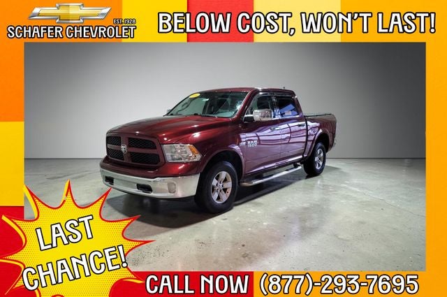 2016 RAM 1500 Outdoorsman in Delmonico Red Pearlcoat — front three-quarter view