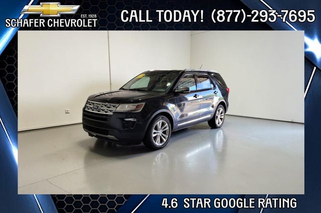 2019 Ford Explorer XLT in Agate Black Metallic — front three-quarter view
