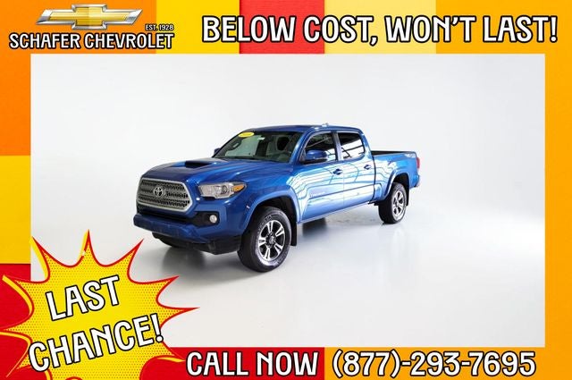 2016 Toyota Tacoma SR5 in Blazing Blue Pearl — front three-quarter view